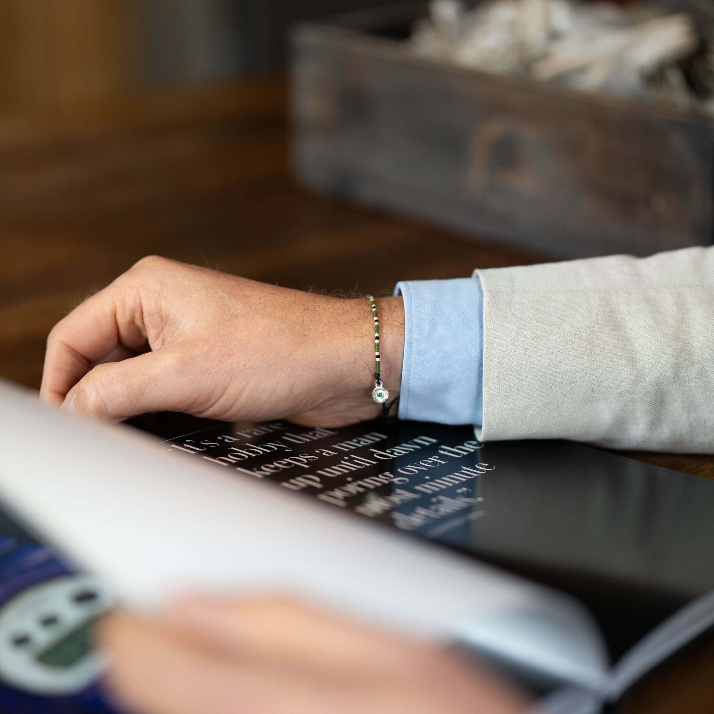 mens green beaded bracelet with 925 sterling silver charm and green zircon stone. Unique for men.