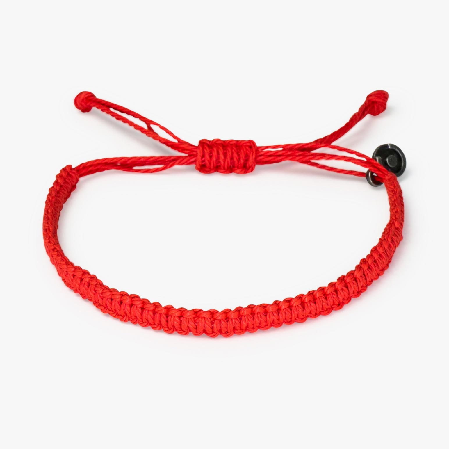 A red woven bracelet with a gunmetal power pose charm, symbolizing good luck.