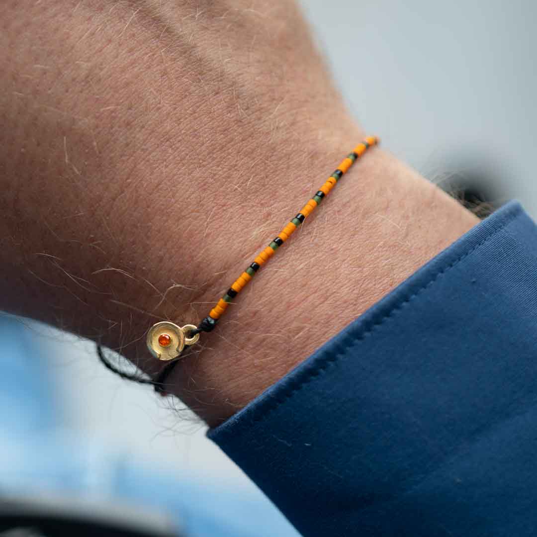 orange and gold charm designer bracelet for men