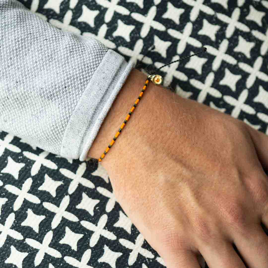 orange beaded designer bracelet for men