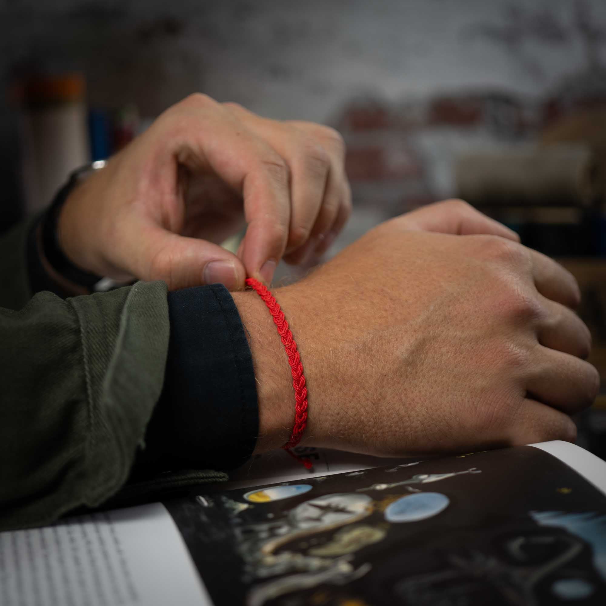 art mens red flow bracelet