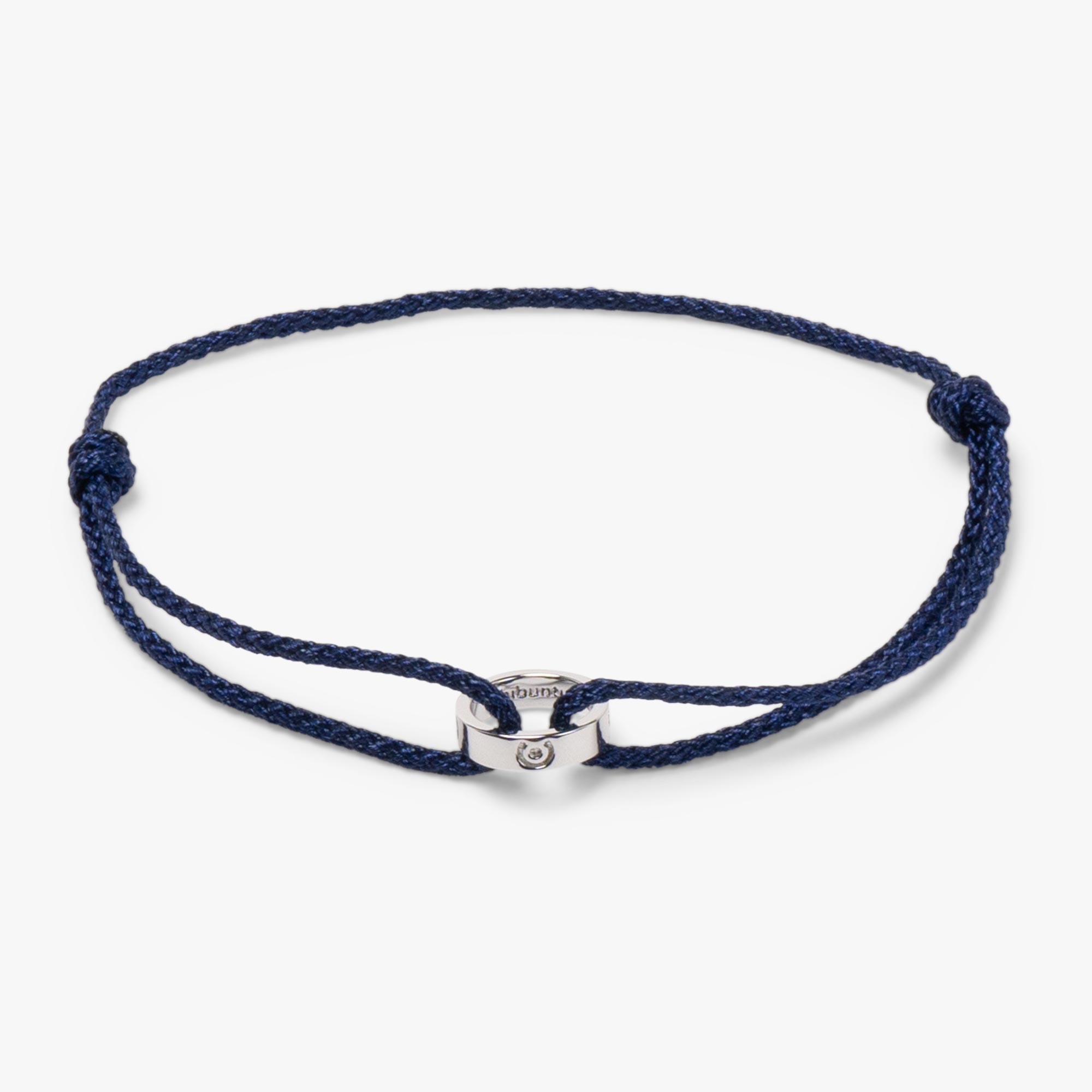 A navy blue adjustable ring bracelet made of sterling silver, displayed against a white background.