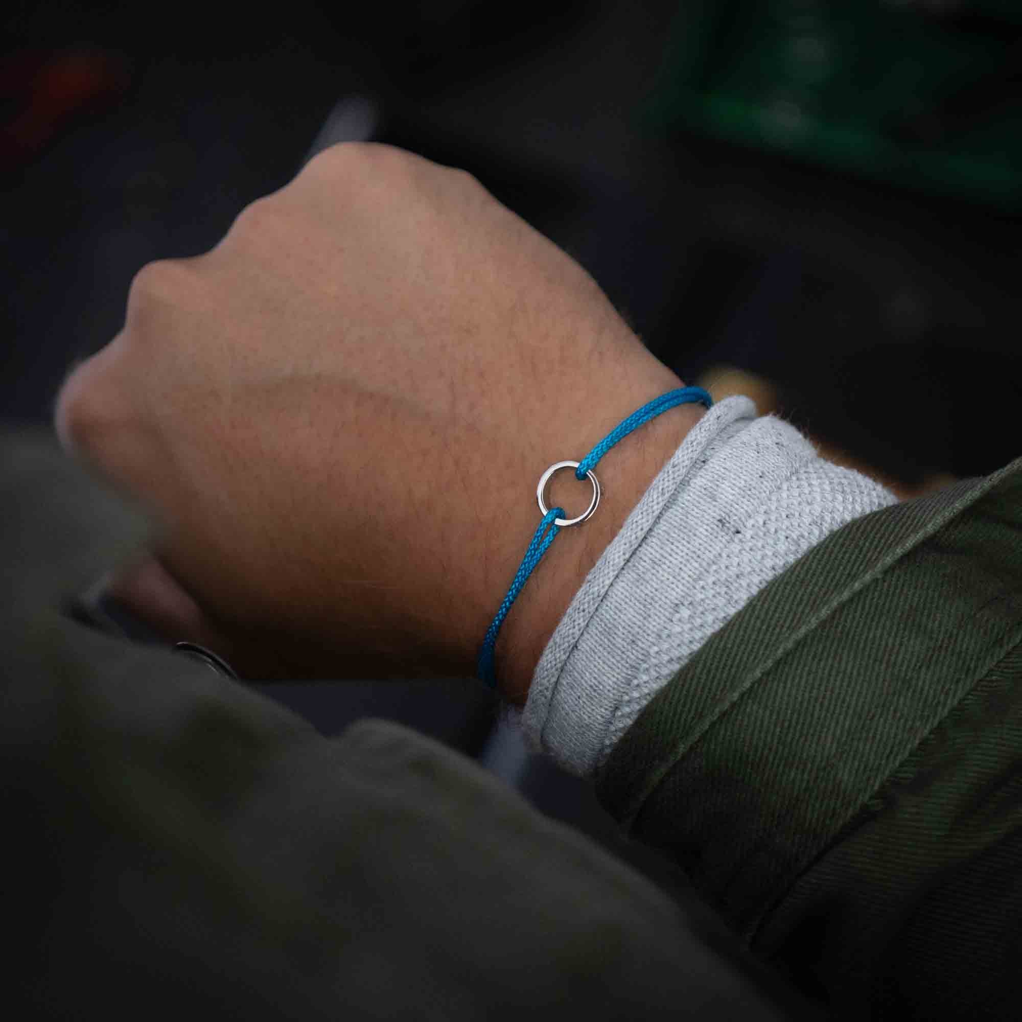 blue thin bracelet with silver ring