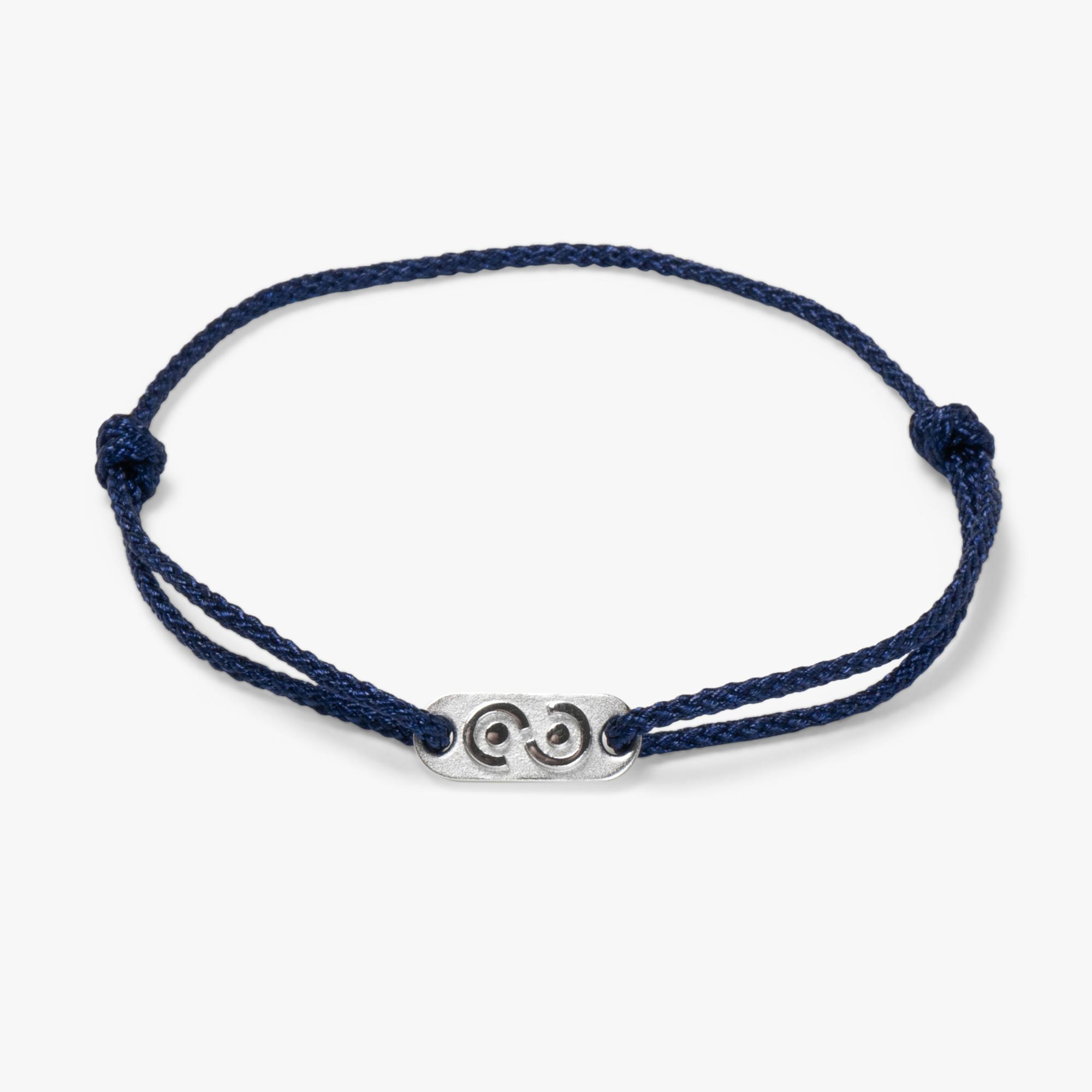 silver charm on blue bracelet for men