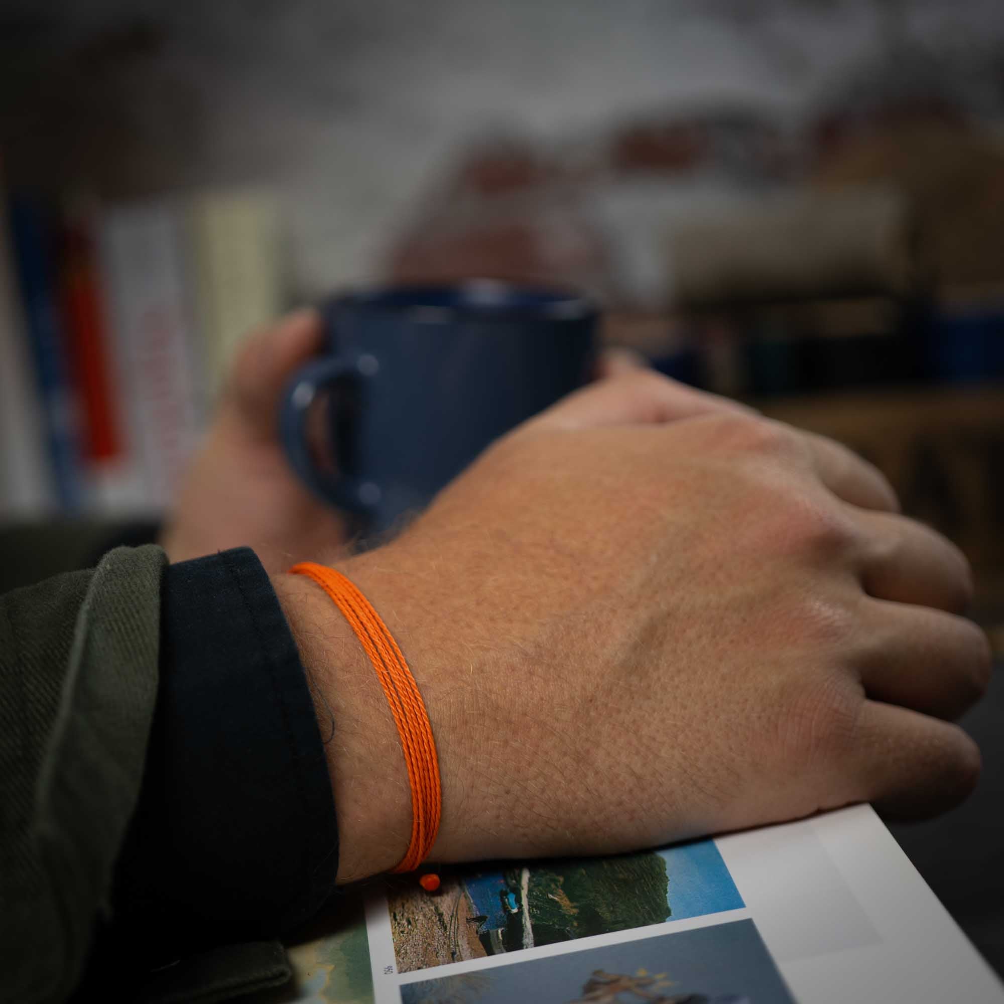 orange string bracelet