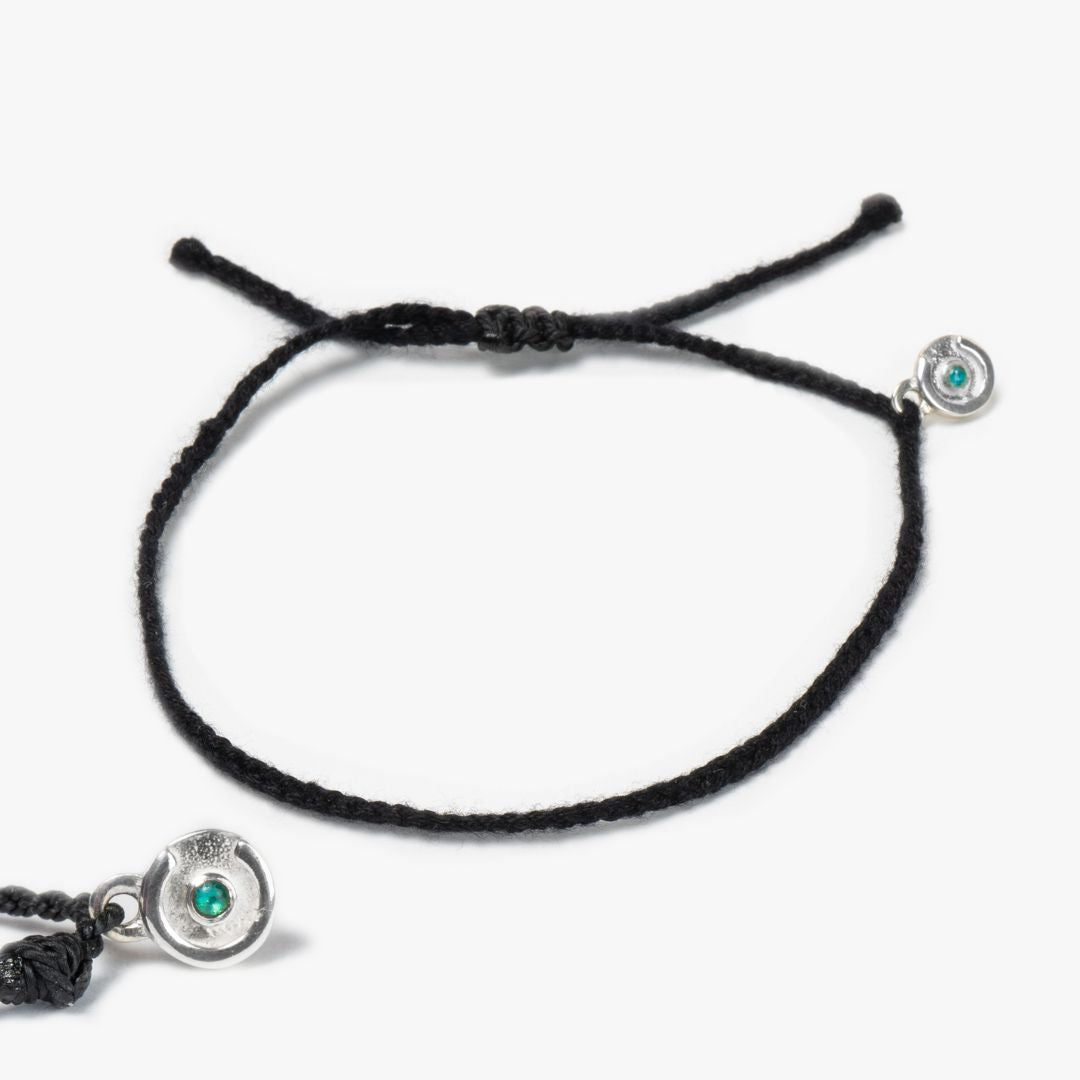 black soft bracelet with blue topaz stone