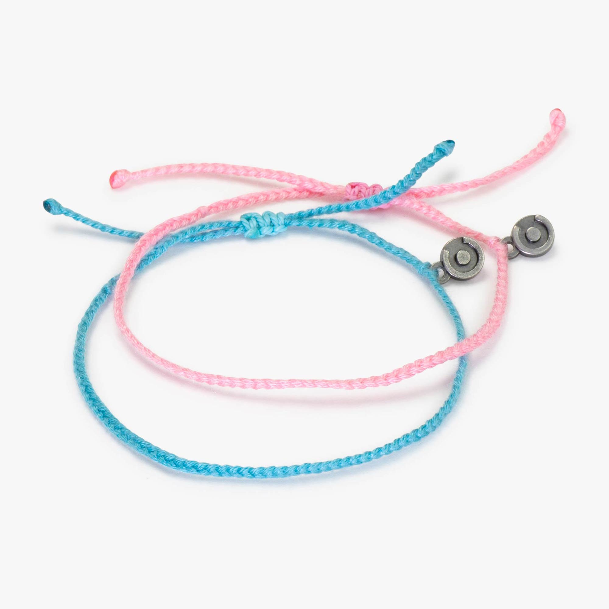 Two bracelets, one light pink and one light blue, with Chibuntu love charms, displayed against a white background.