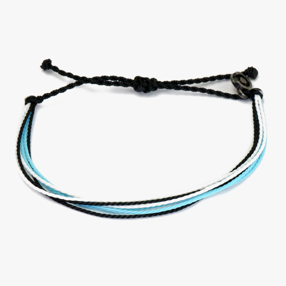 A two-tone (black and blue) string bracelet with a chibuntu charm, displayed on a white background.
