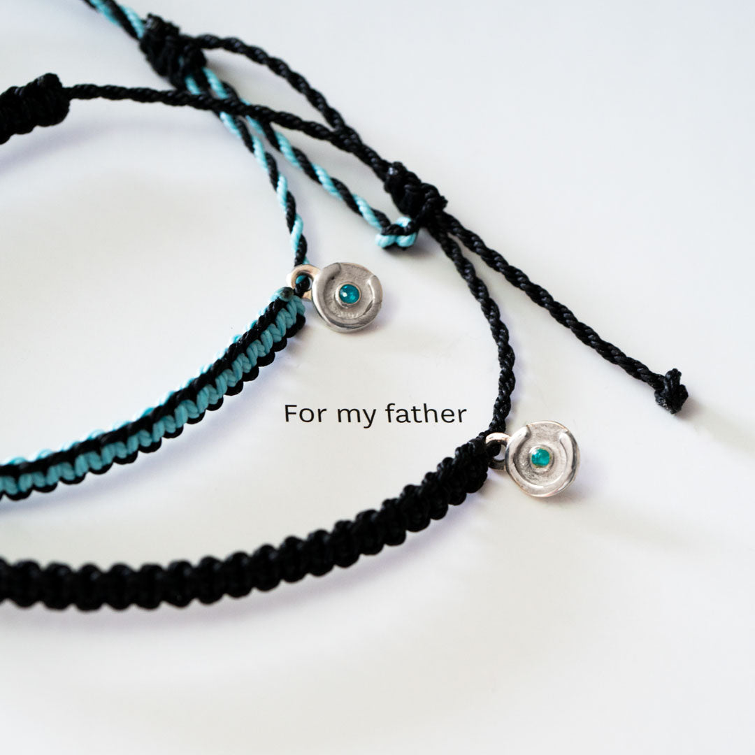 Baby Bond Cobra bracelet with 925S Silver & Blue Topaz Power Pose charm