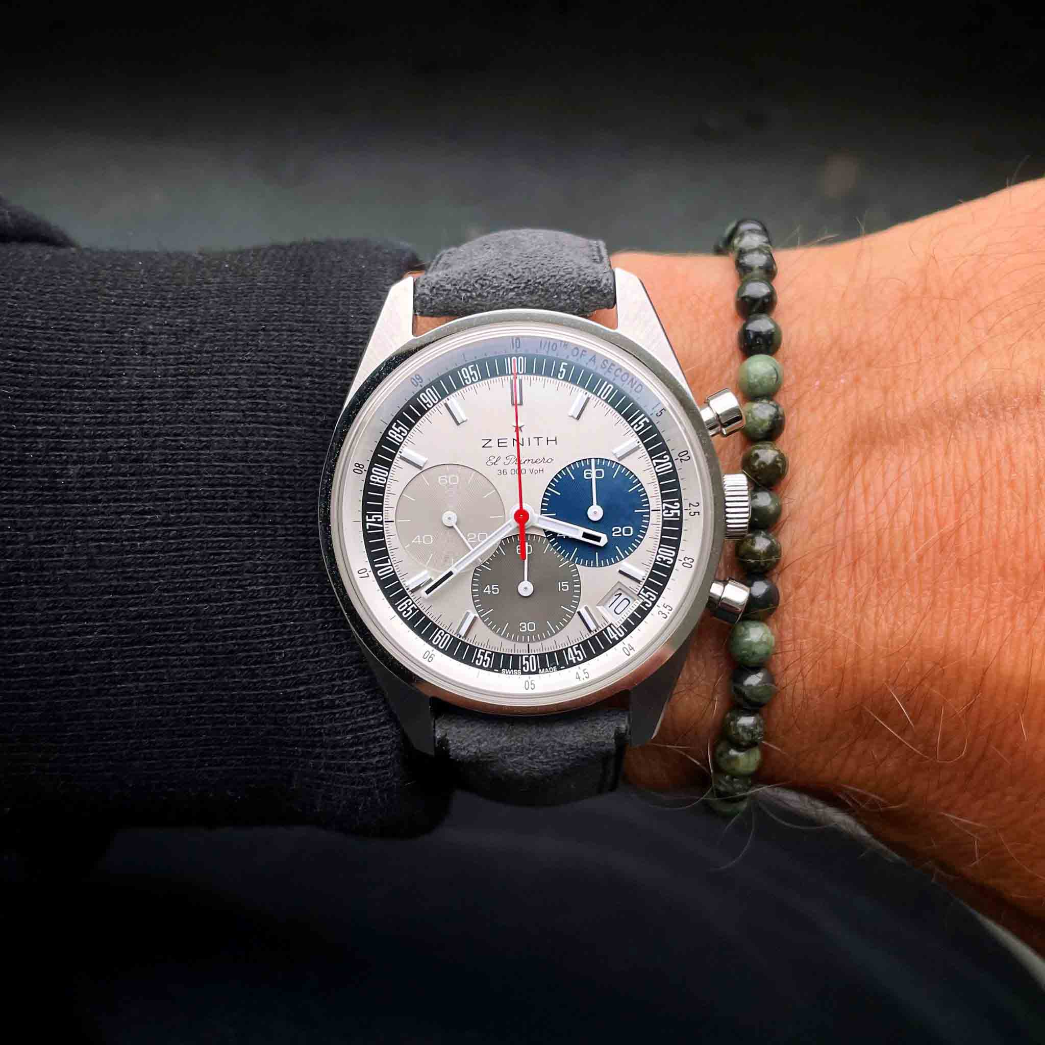 zenith watch and moss agate bracelet side by side