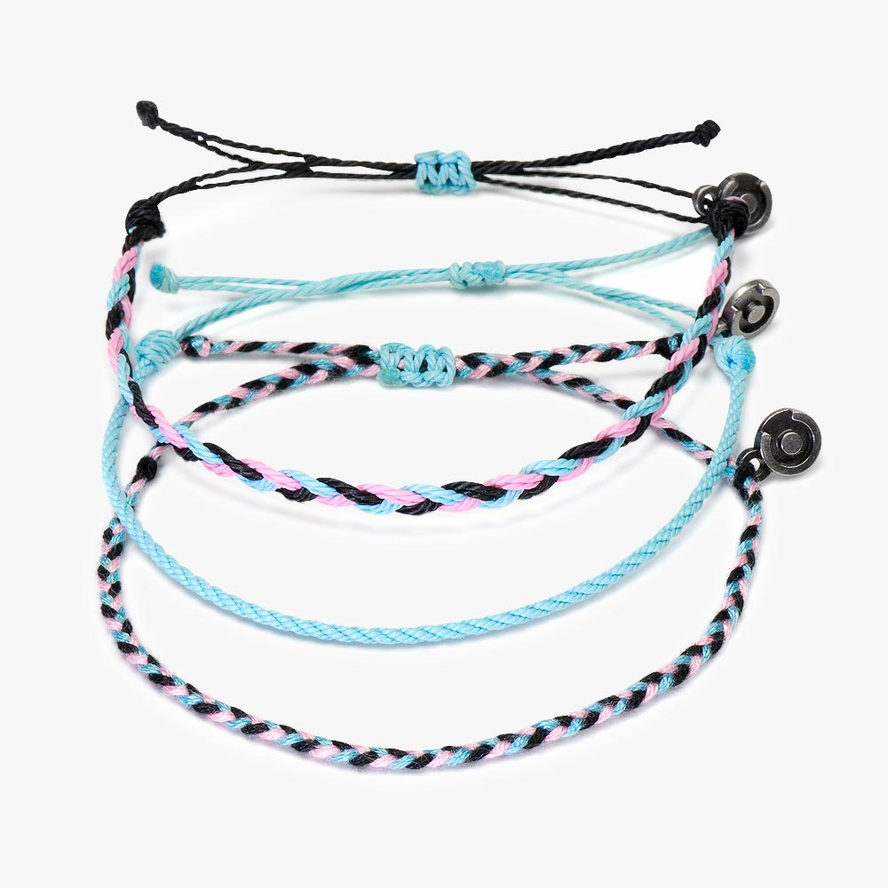 A set of three wax-coated polyester bracelets in black, pink, and blue colors, featuring Chibuntu charms, displayed against a white background.