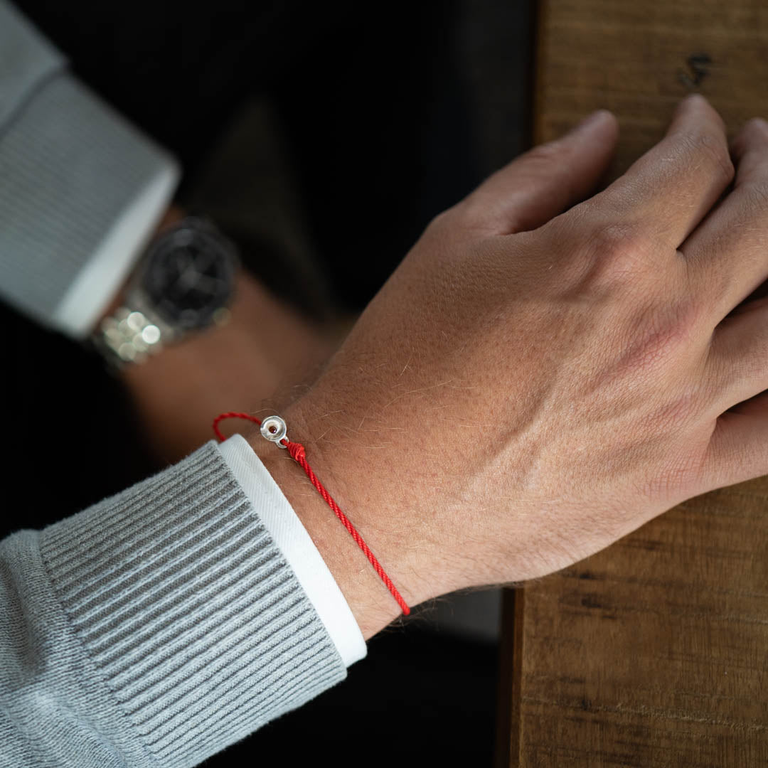 red bracelet zilver charm