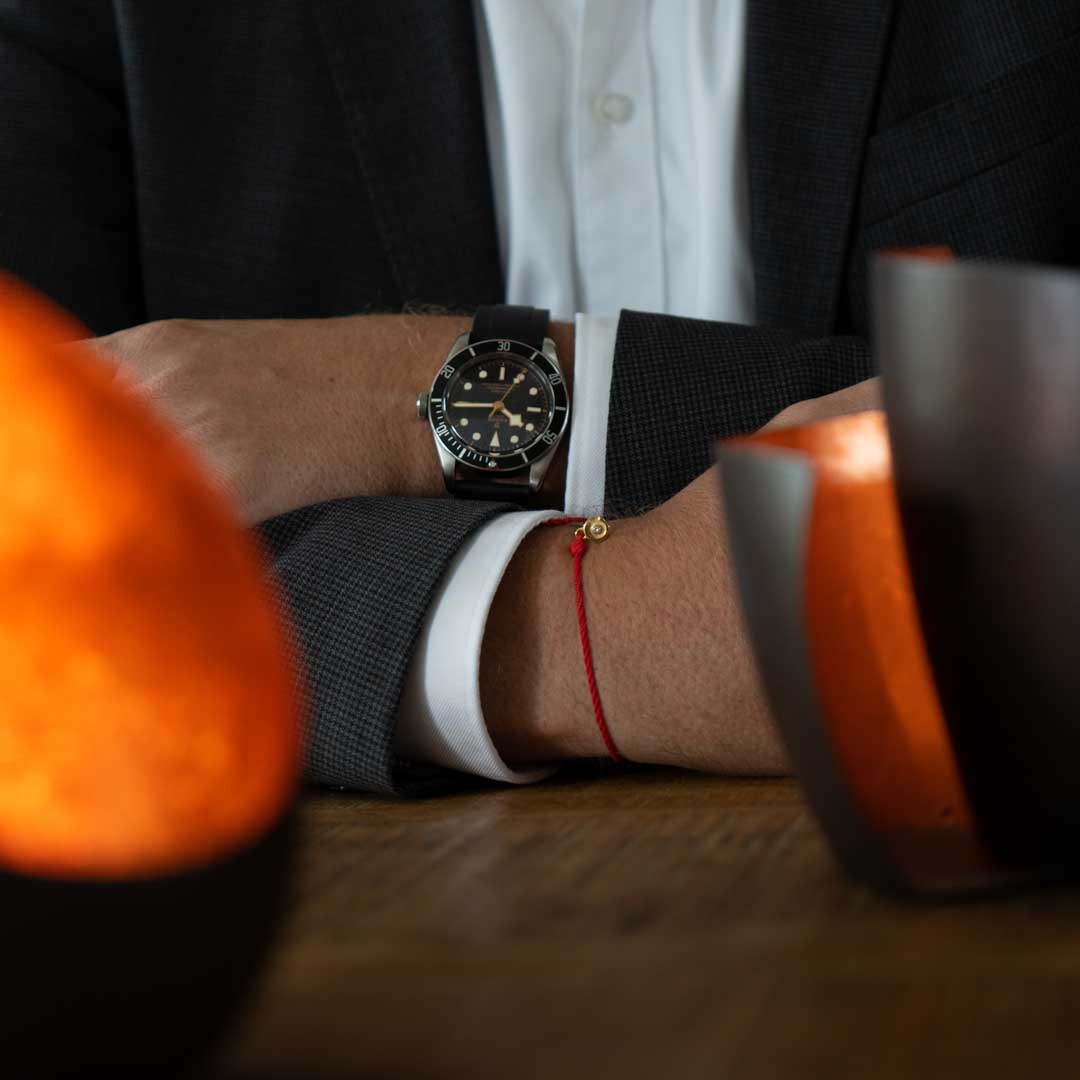 red mens bracelet with diamond stone