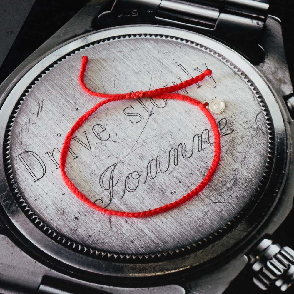 red mens bracelet with meaning