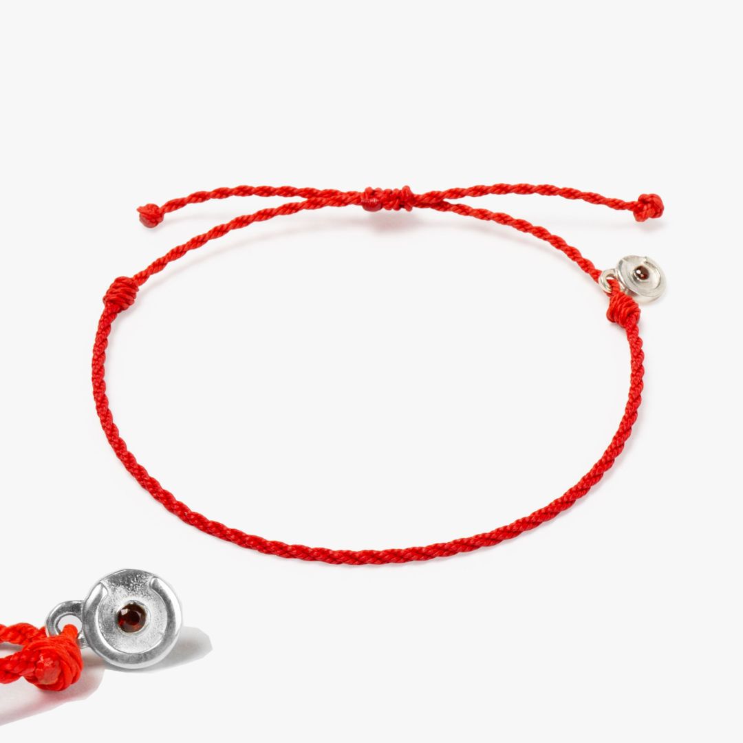 red mens bracelet with silver charm