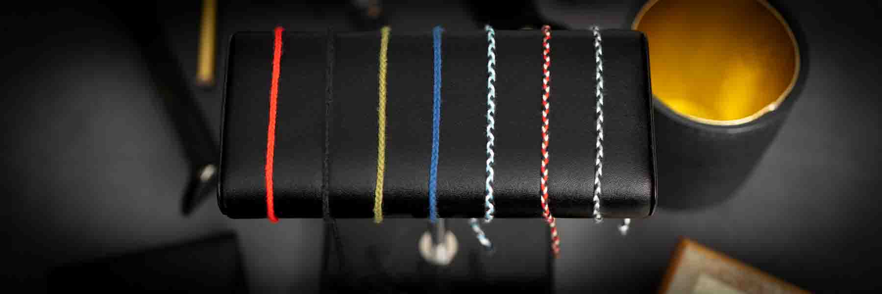 Considered cotton designer men bracelet showing tight weave and restrained hardware finish