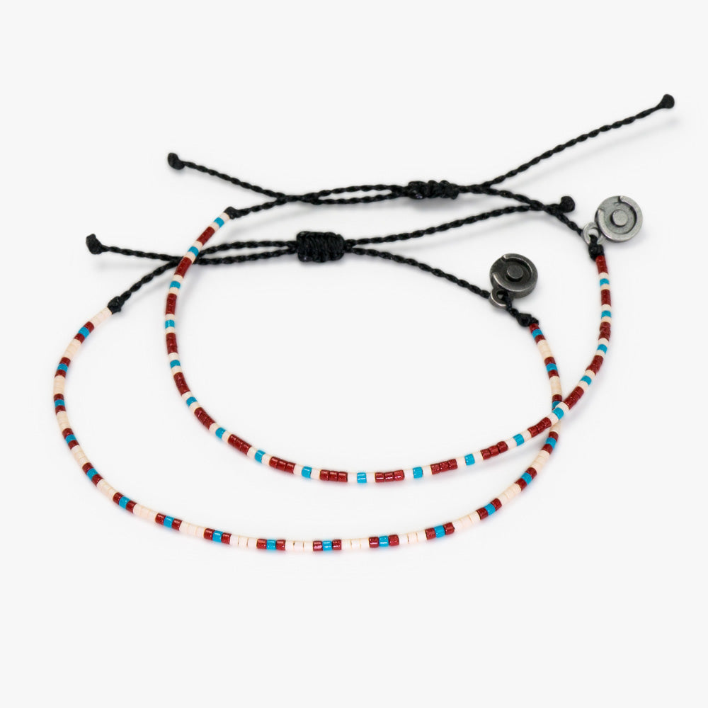 Two adjustable beaded bracelets with a mix of colorful beads and a black Chibuntu charm, on a white background.