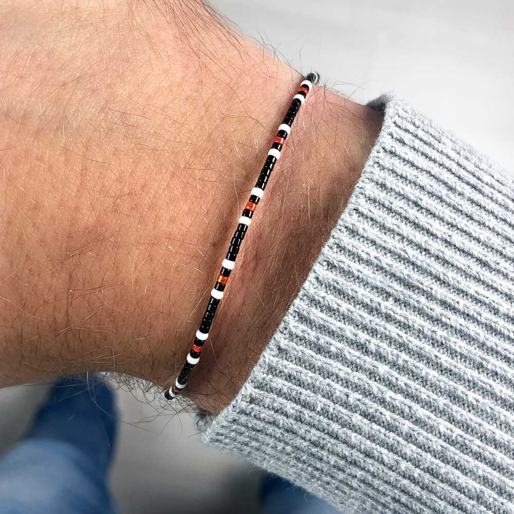 bali beaded bracelet on right wrist